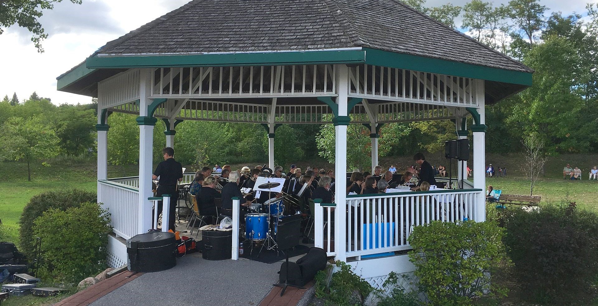 gazebo filled with musical entertainers