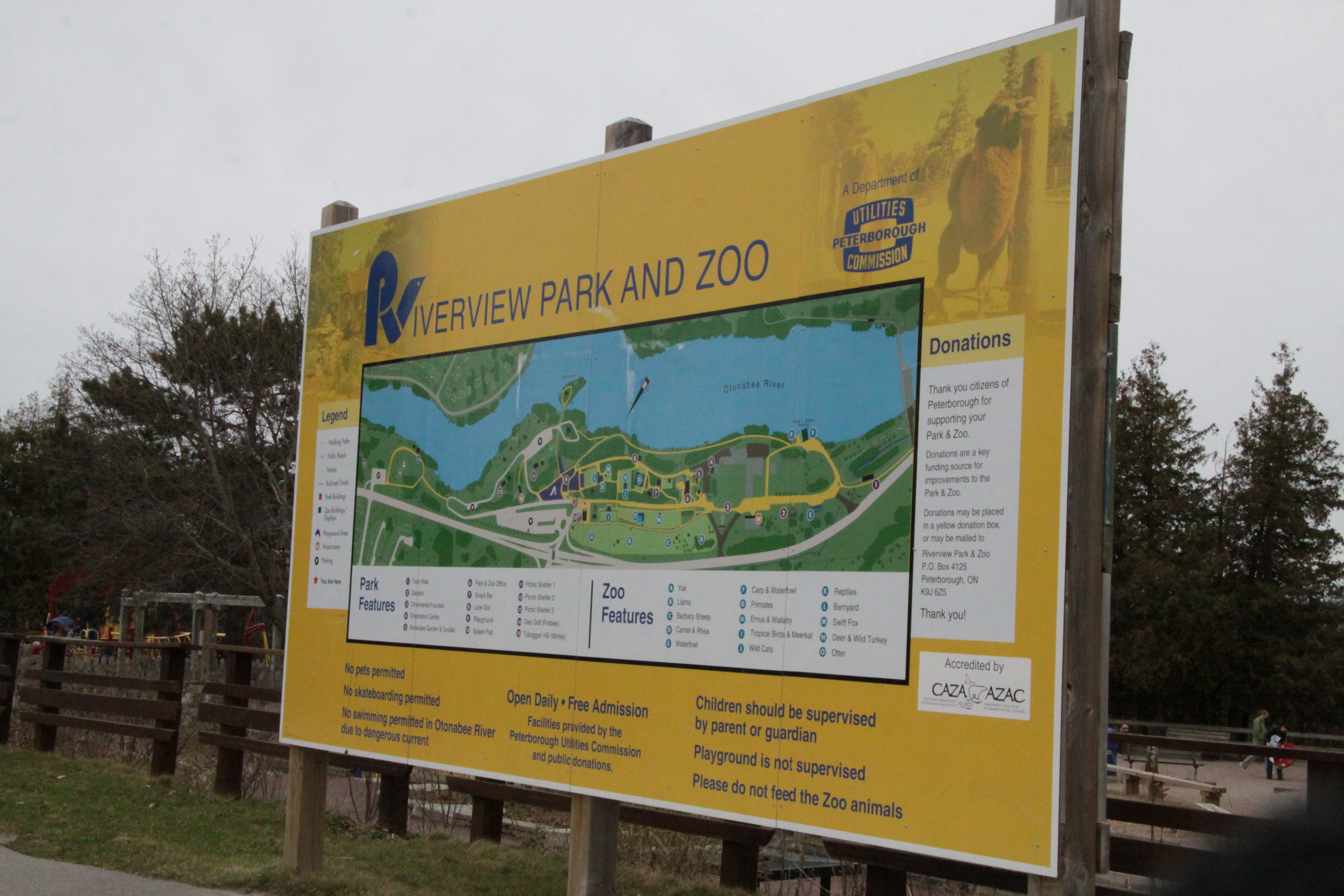 large sign showing a map of riverview park and zoo