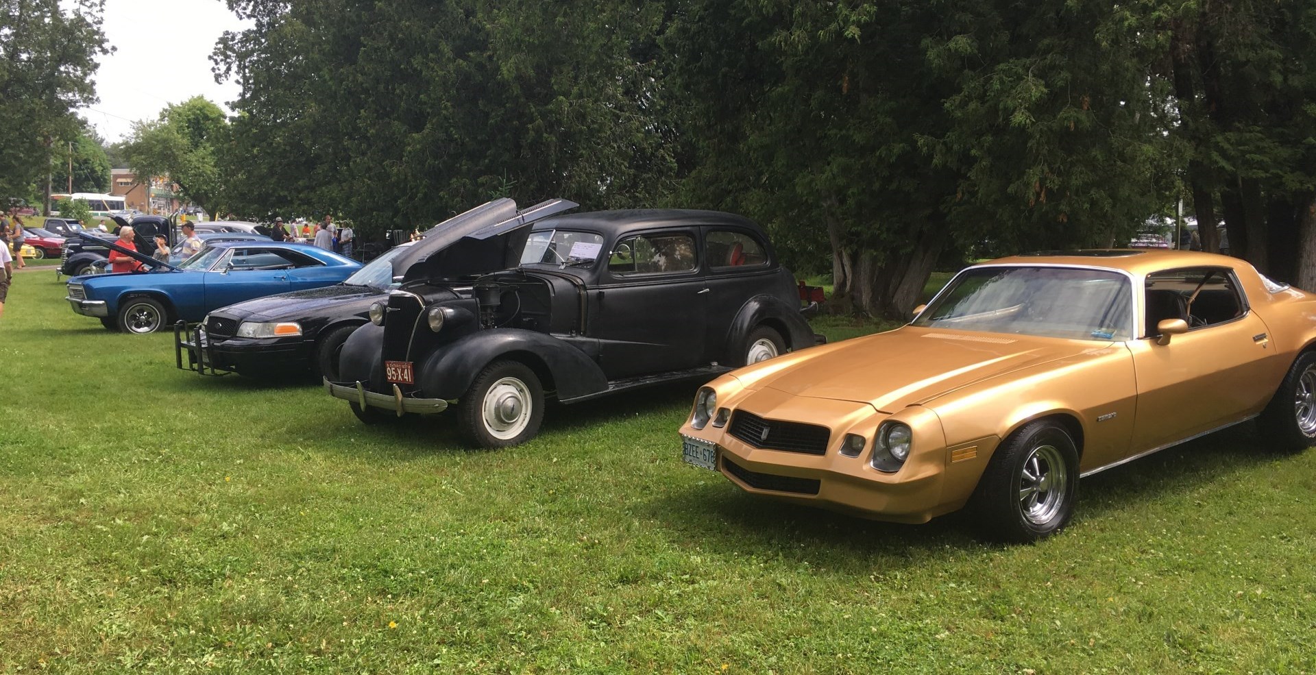 a row of classic cars on display
