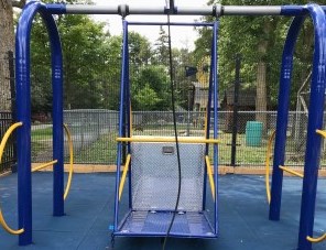 Blue and yellow accessible wheelchair swing