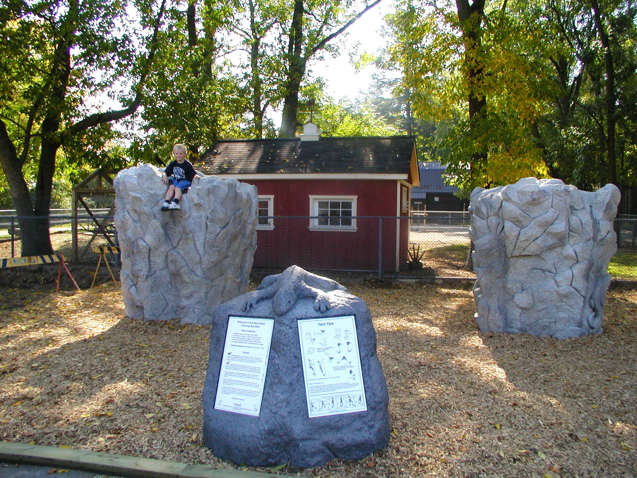 two climbing rocks and how to guide in playgroup with boy