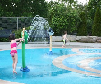 Come keep cool during the summer months sprayer spouting water in the splash pad