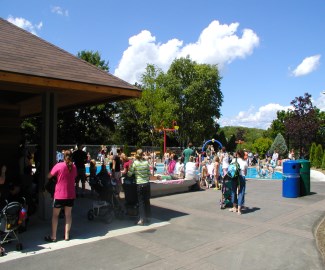Splash pad full of people on the first day