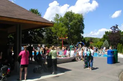 busy splash pad opening day